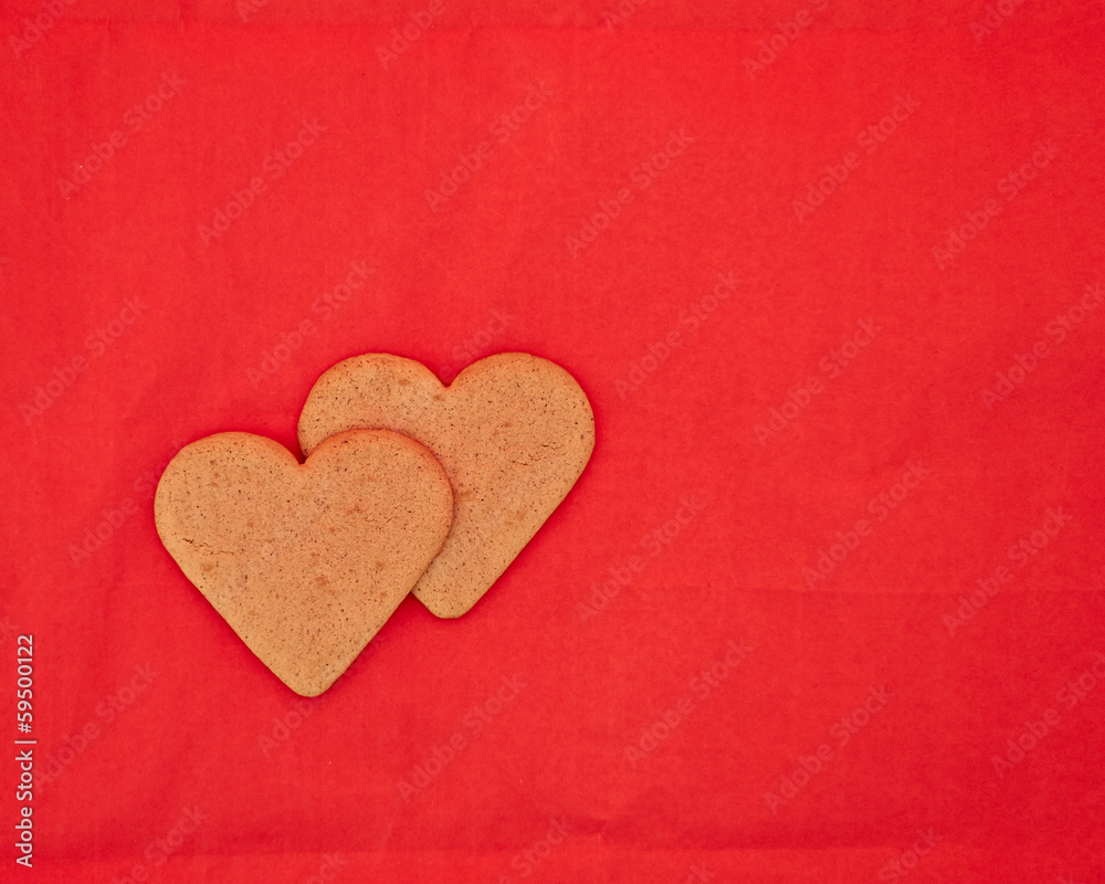 Obraz premium a couple of homemade heart shaped cookies