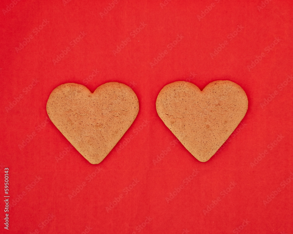 Obraz premium a couple of homemade heart shaped cookies