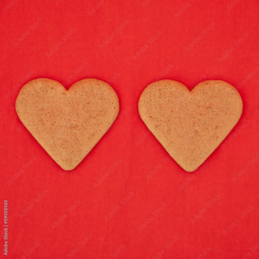 a couple of homemade heart shaped cookies a couple of homemade heart shaped cookies