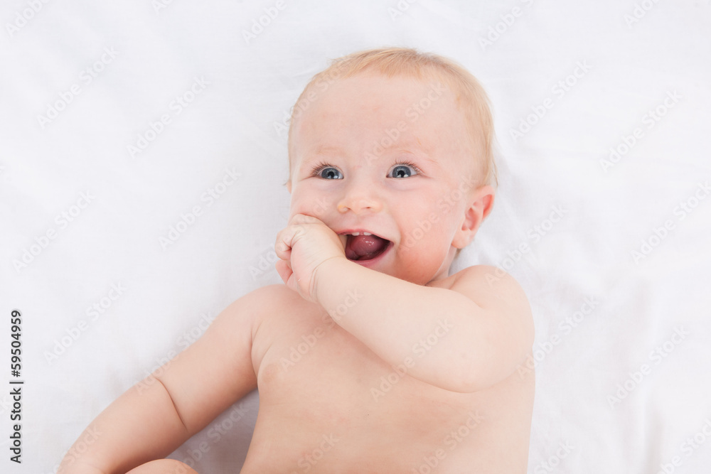 Cute funny little baby laughing and looking at camera. Cute funny little baby laughing and looking at camera.