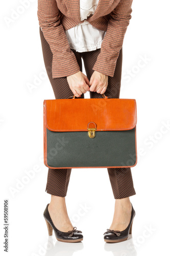 Business woman holding a briefcase