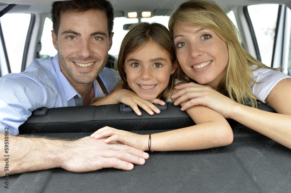 Cheerful family of three ready for vacation