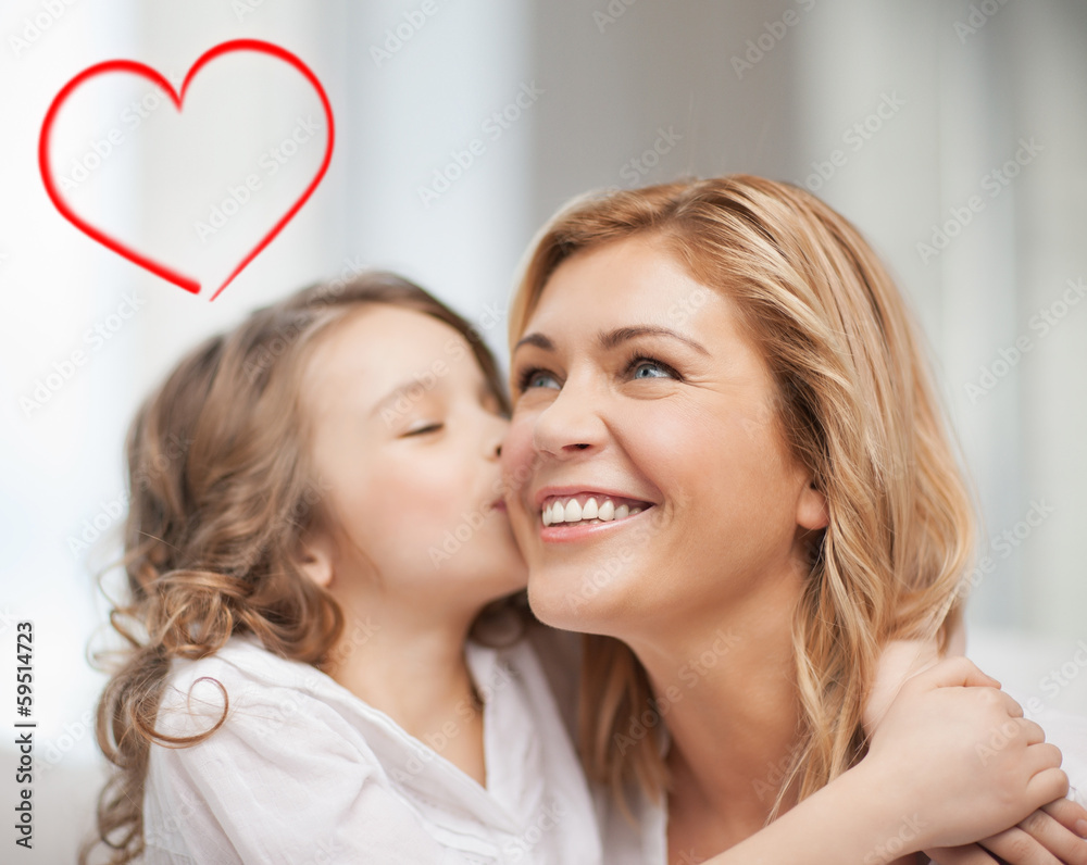 smiling mother and daughter hugging smiling mother and daughter hugging