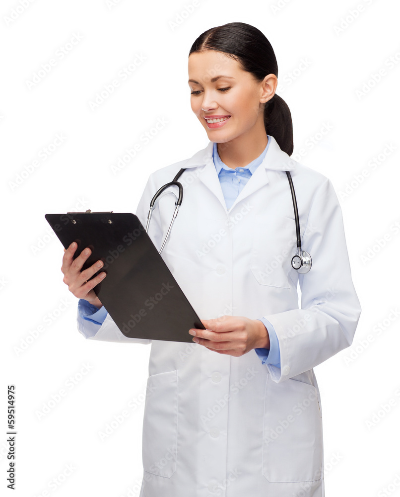 smiling female doctor with clipboard