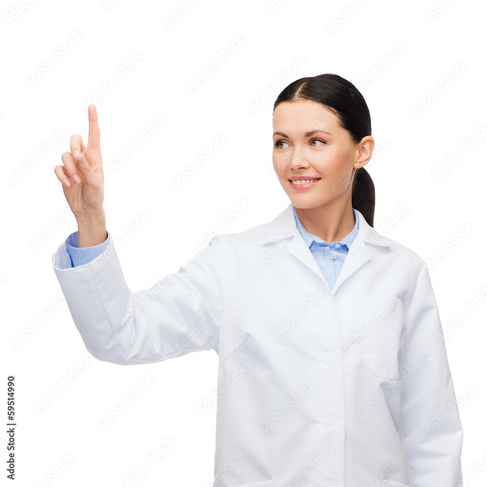 smiling female doctor pointing to something smiling female doctor pointing to something