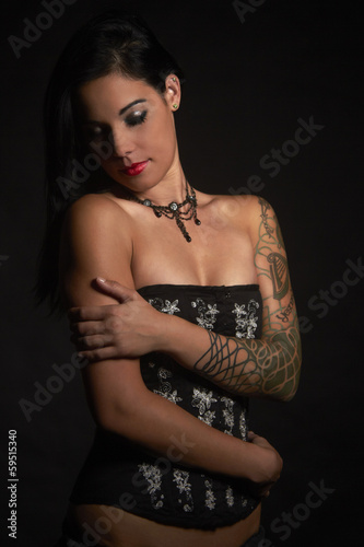 Beautiful sexy glamorous girl with tattoos