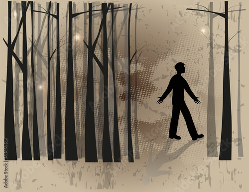 silhouette di uomo che si è perso nel bosco