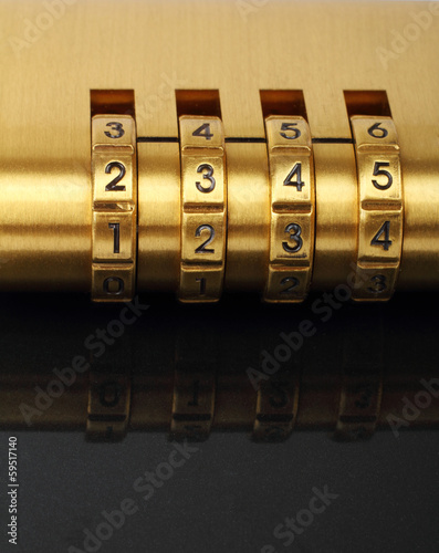 Golden padlock with combination lock