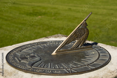 Bronze sundial with inscription