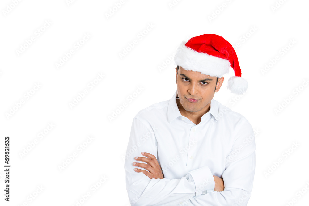 Portrait sad man in santa hat isolated over white background Portrait sad man in santa hat isolated over white background