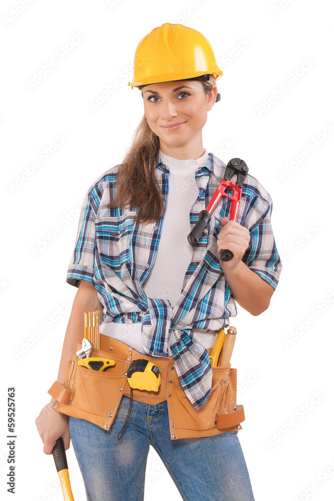 beautiful sexy girl in work wear holding tools isolated on white beautiful sexy girl in work wear holding tools isolated on white