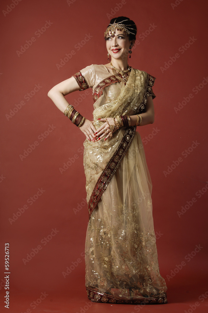 beautiful female wearing traditional indian costume