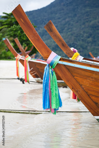 Part of traditional longtail boats on the beach