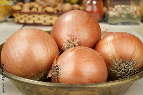 onion in copper tray