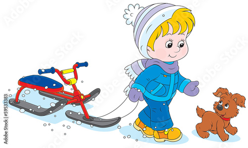 Little child carrying a snow scooter