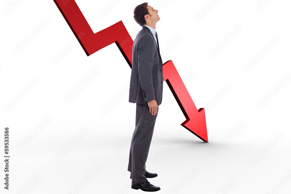 Composite image of happy businessman with hand in pocket Composite image of happy businessman with hand in pocket