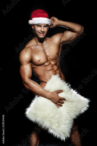 Obraz na płótnie Smiling handsome Santa Claus naked. w salonie