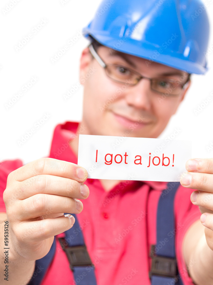 Worker holding a sign Worker holding a sign