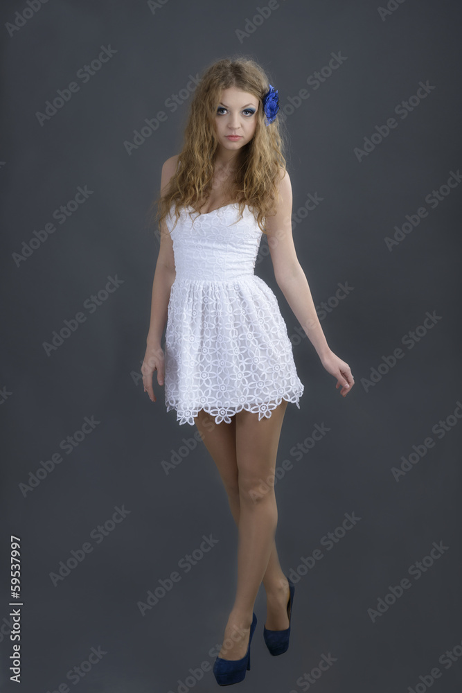 Young elegant fashionable woman on gray background Young elegant fashionable woman on gray background