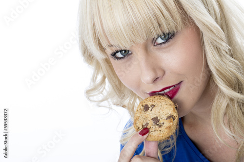 Young Woman Eating a Chocolate Chip Cookie Biscuit