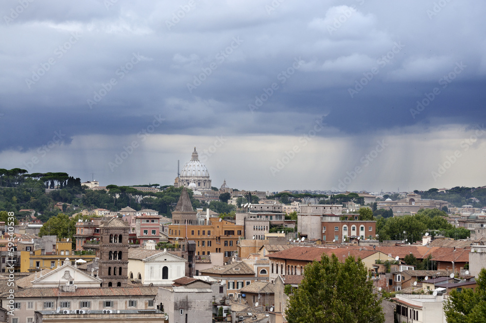 Clouds and rain over the dome of St Peter