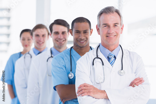 Doctors standing in a row at hospital