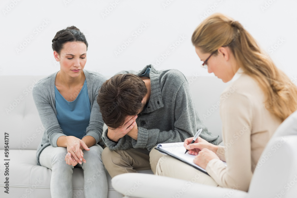 Couple in meeting with a financial adviser Couple in meeting with a financial adviser