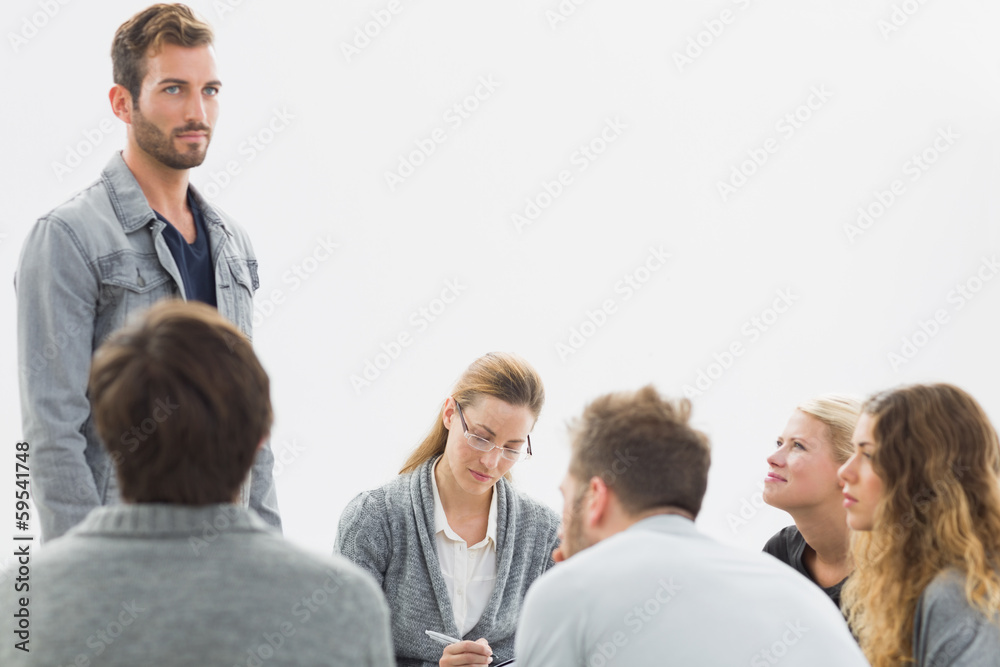 Fototapeta premium Group therapy in session sitting in a circle