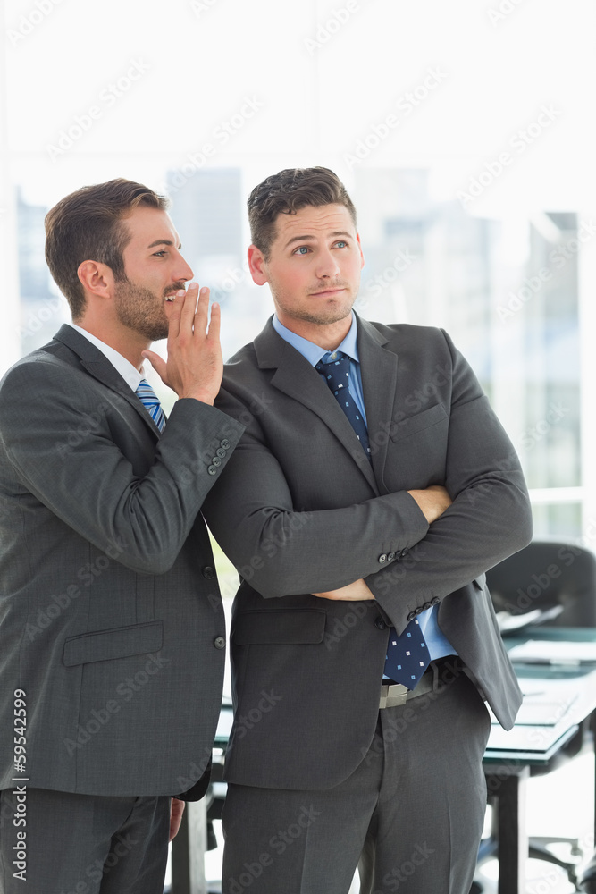 Young well dressed businessmen in discussion Young well dressed businessmen in discussion