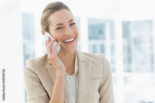 Portrait of a young businesswoman using mobile phone