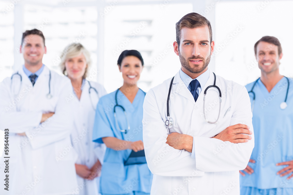 Confident happy group of doctors at medical office Confident happy group of doctors at medical office