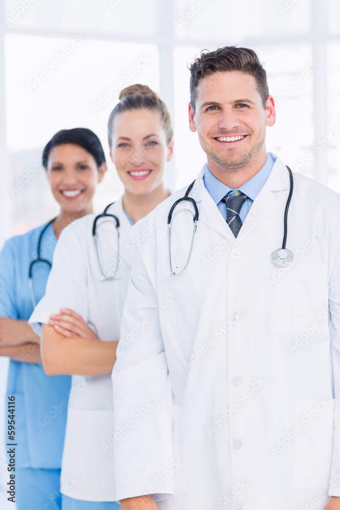 Confident happy group of doctors at medical office Confident happy group of doctors at medical office