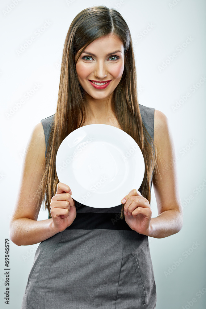 portrait of business woman hold empty white plate. portrait of business woman hold empty white plate.