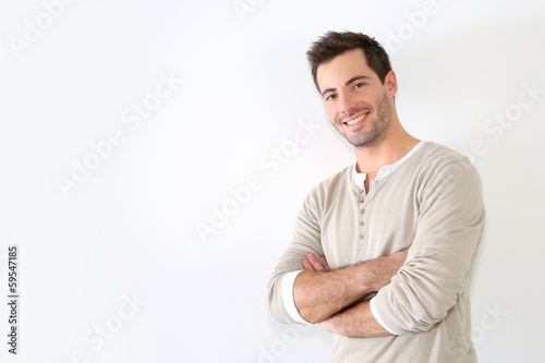 Handsome guy standing on white background