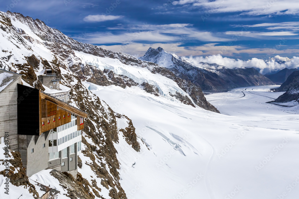 Hotel against the Aletsch glacier. Swiss Alps. Stock Photo | Adobe Stock