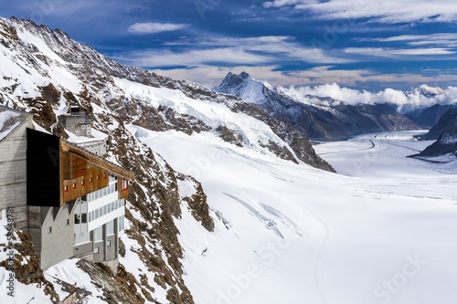 Hotel against the Aletsch glacier. Swiss Alps.