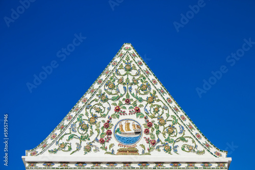 Tympanum at Wat Nang Chee Chotikaram, Bangkok. photo