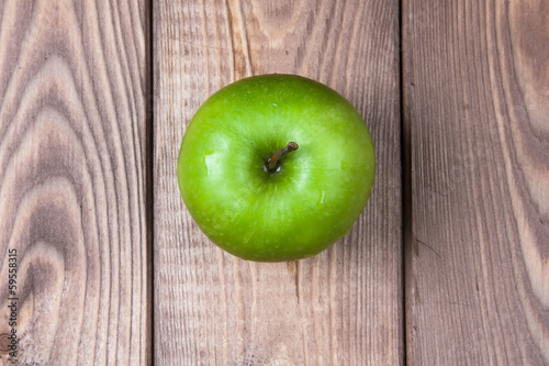 Apple on a wooden background top view