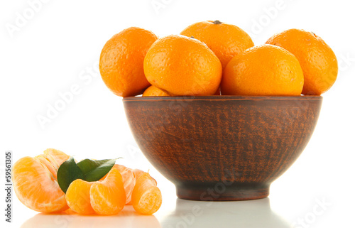 Ripe tangerines in bowl isolated on white
