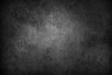 Black textured stone wall background