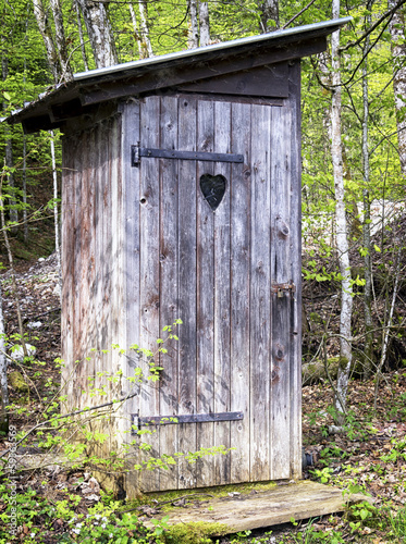 old wooden outhouse
