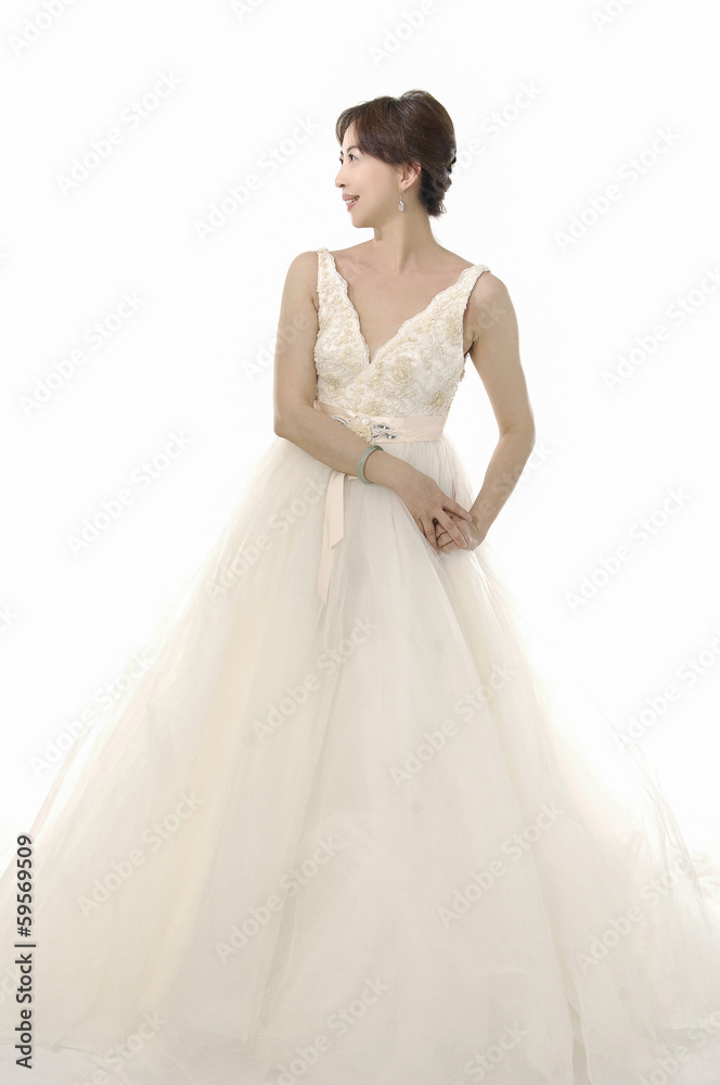 young and beautiful bridge in white dress in studio young and beautiful bridge in white dress in studio