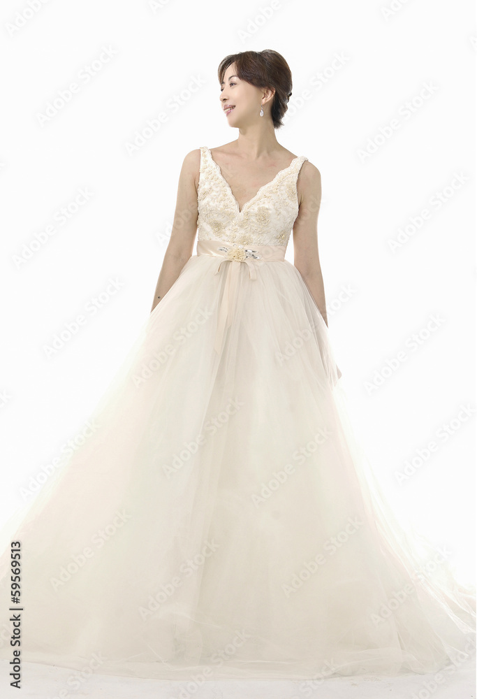 young and beautiful bridge in white dress in studio young and beautiful bridge in white dress in studio