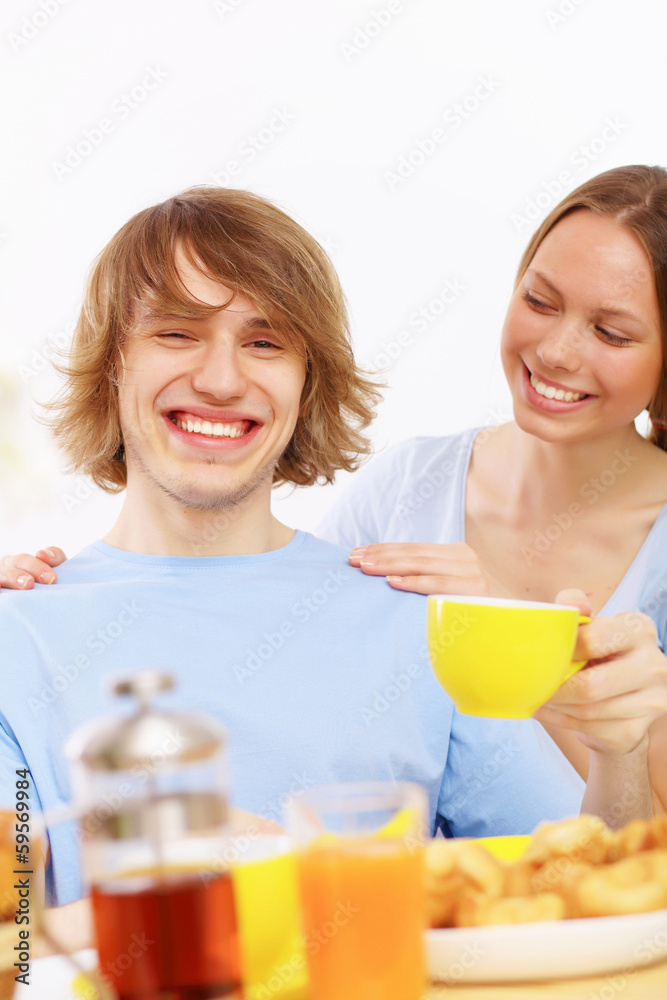 Couple at home drinking tea Couple at home drinking tea