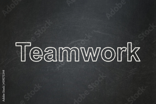 Business concept: Teamwork on chalkboard background