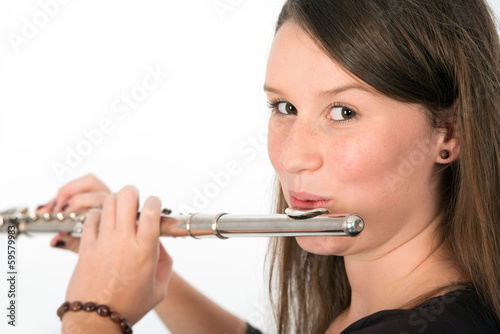 young woman playing transverse flute