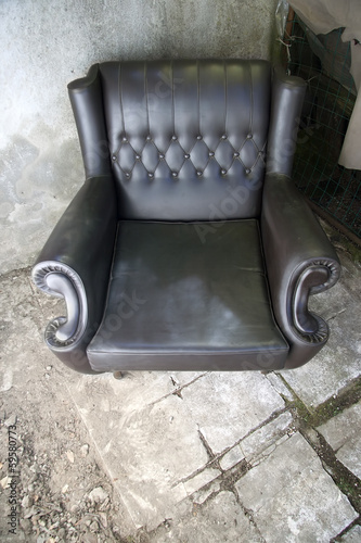 Fotografie abandoned armchair, decadence concept