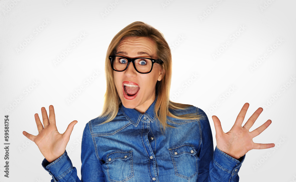 Excited pretty blond woman wearing geek retro glasses Excited pretty blond woman wearing geek retro glasses