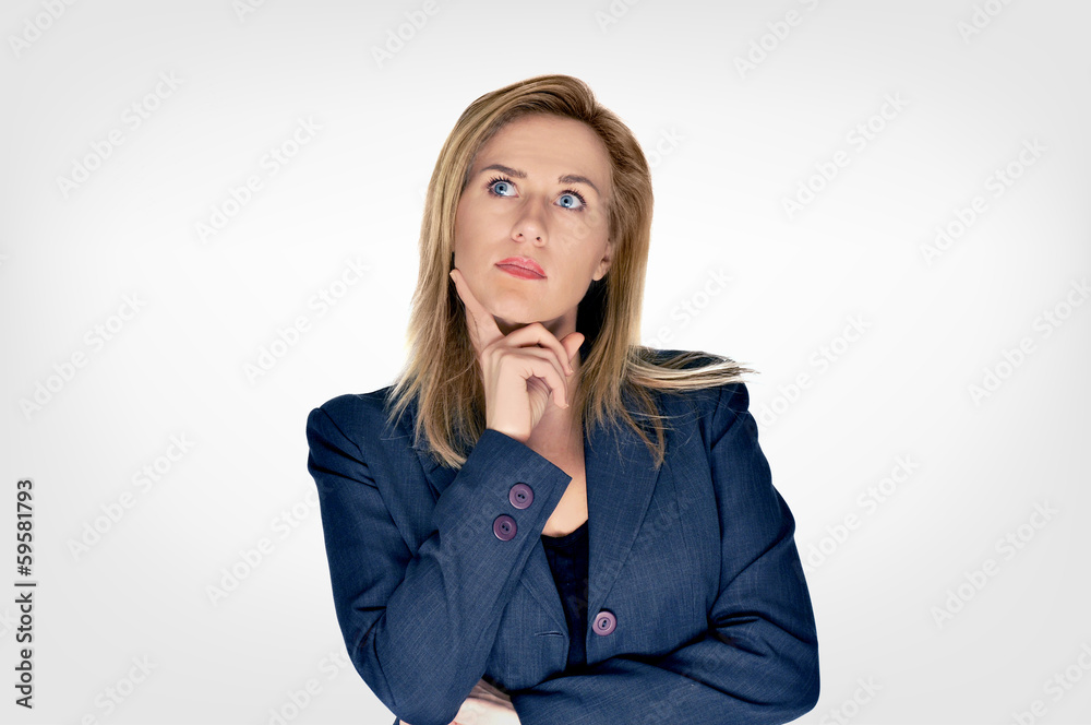 Young beautiful blonde business woman thinking Young beautiful blonde business woman thinking