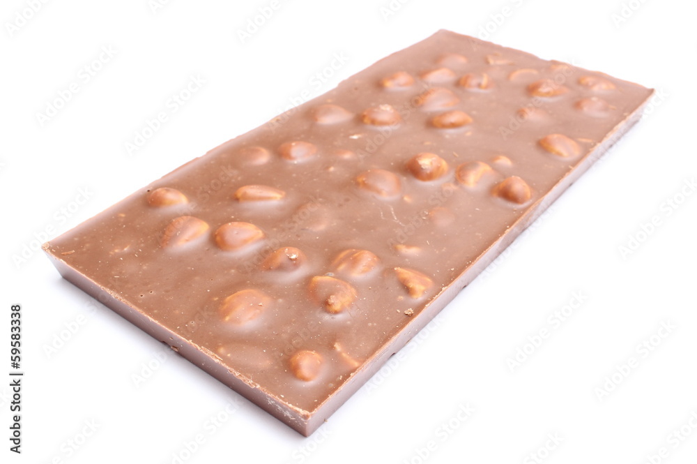 Whole chocolate with nuts on white background